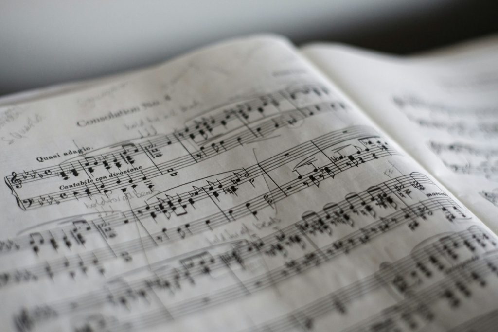 Close-up of sheet music with handwritten notes.